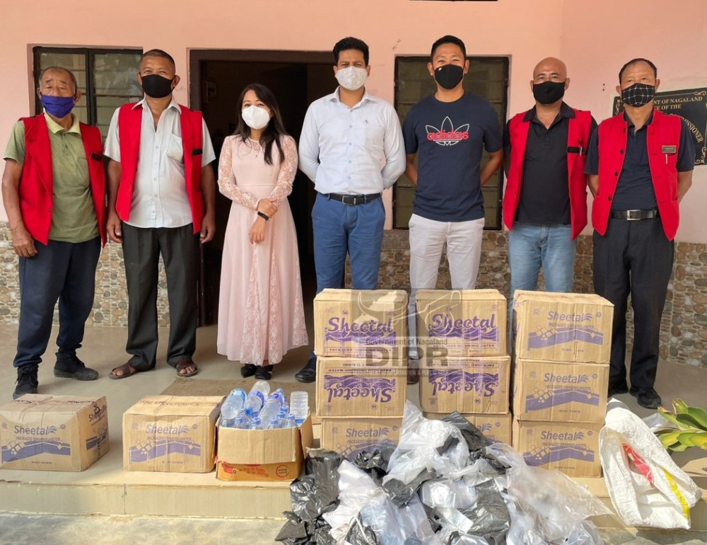 Officials in Mangkolemba with the seized items